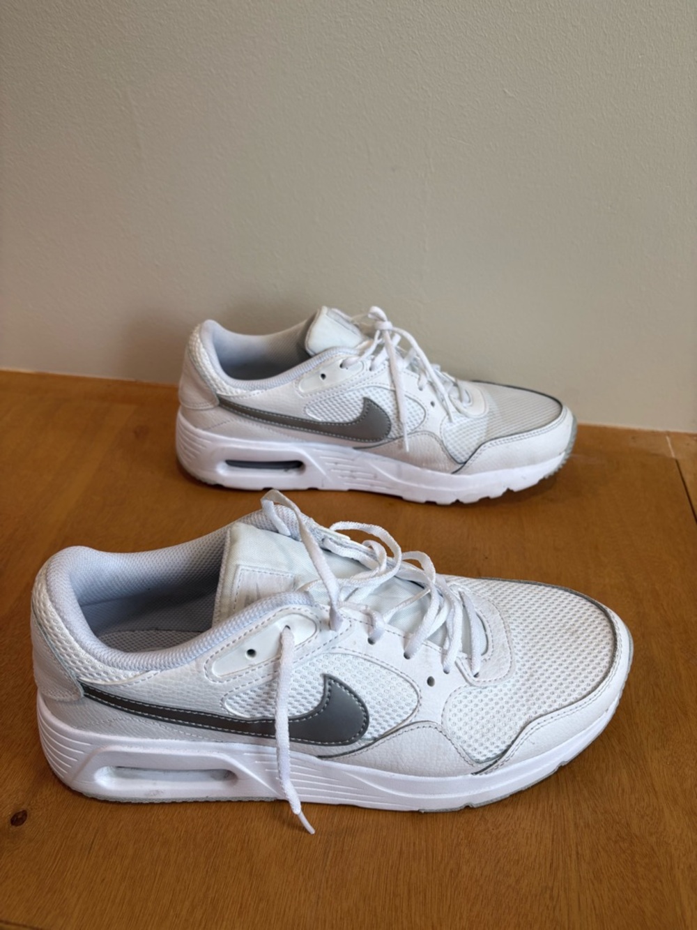 Nike women’s White and Silver Low-Top Sneakers